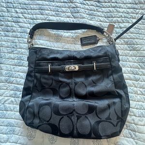 Coach black canvas bag with ‘C’ pattern on fabric